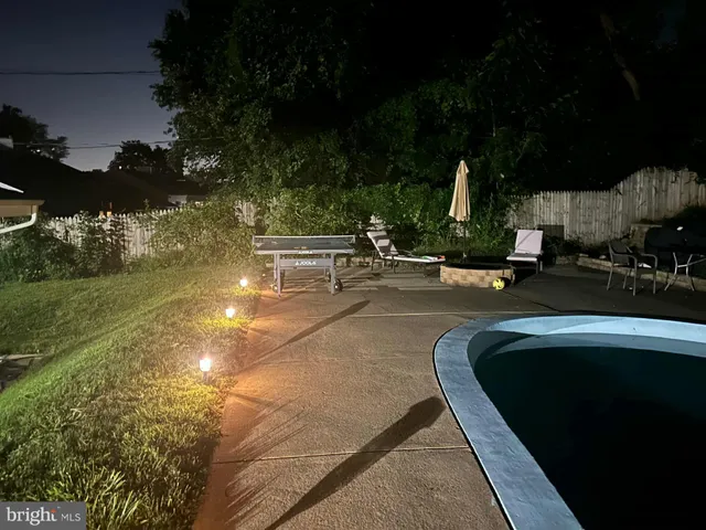 a view of a backyard with green space