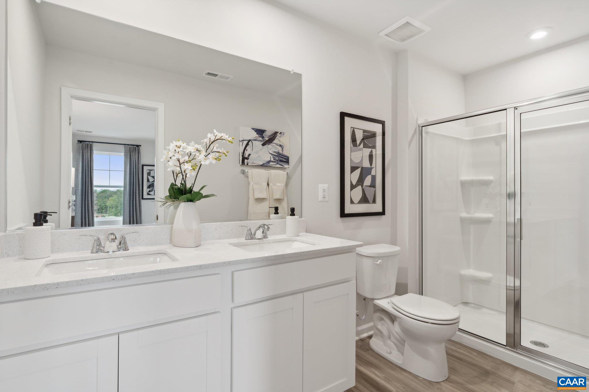 Tbd Lot 94 Tbd Road, Unit 94 Barboursville, VA 22923 - Photo 11 of 39 a bathroom with a toilet a sink and a large mirror
