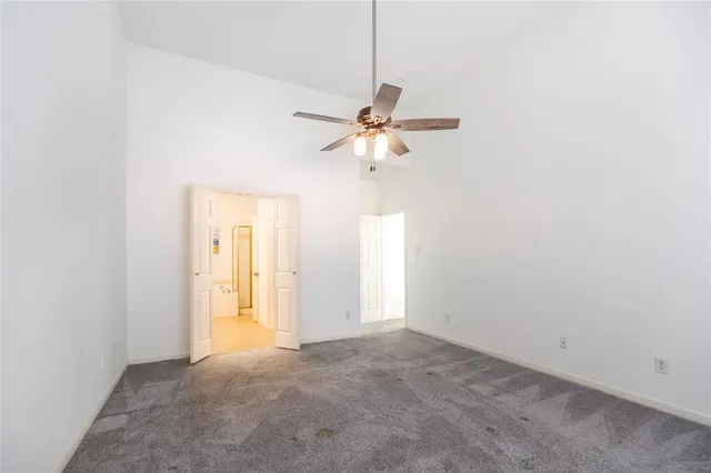 a view of a chandelier fan in a room