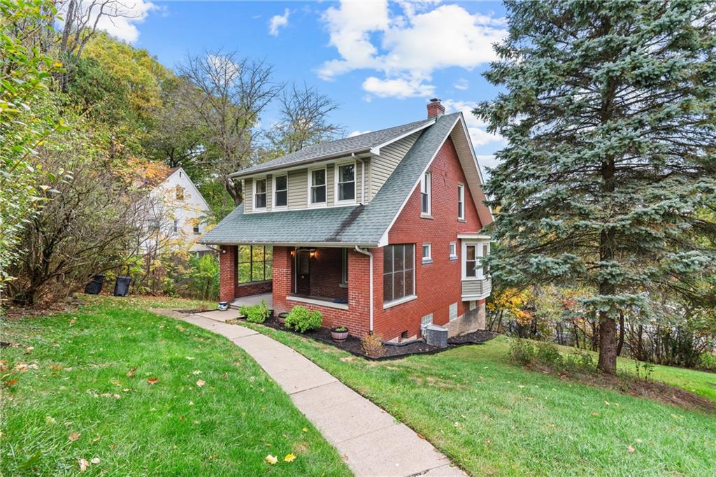 27 North Park Road Pittsburgh, PA 15229 - Photo 4 of 33 a front view of house with yard and green space