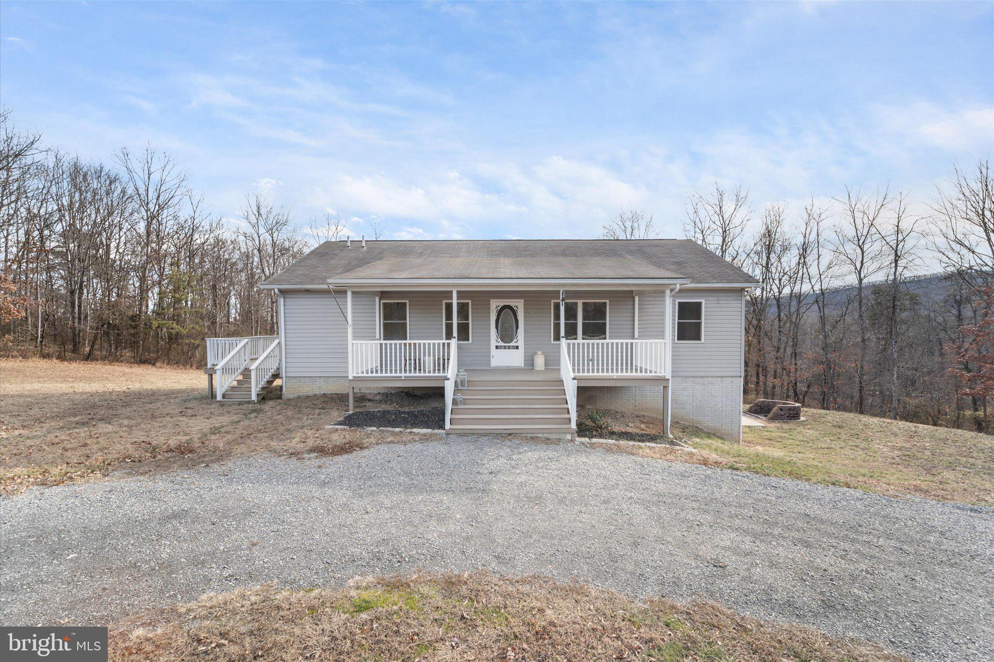 a view of house with a outdoor space