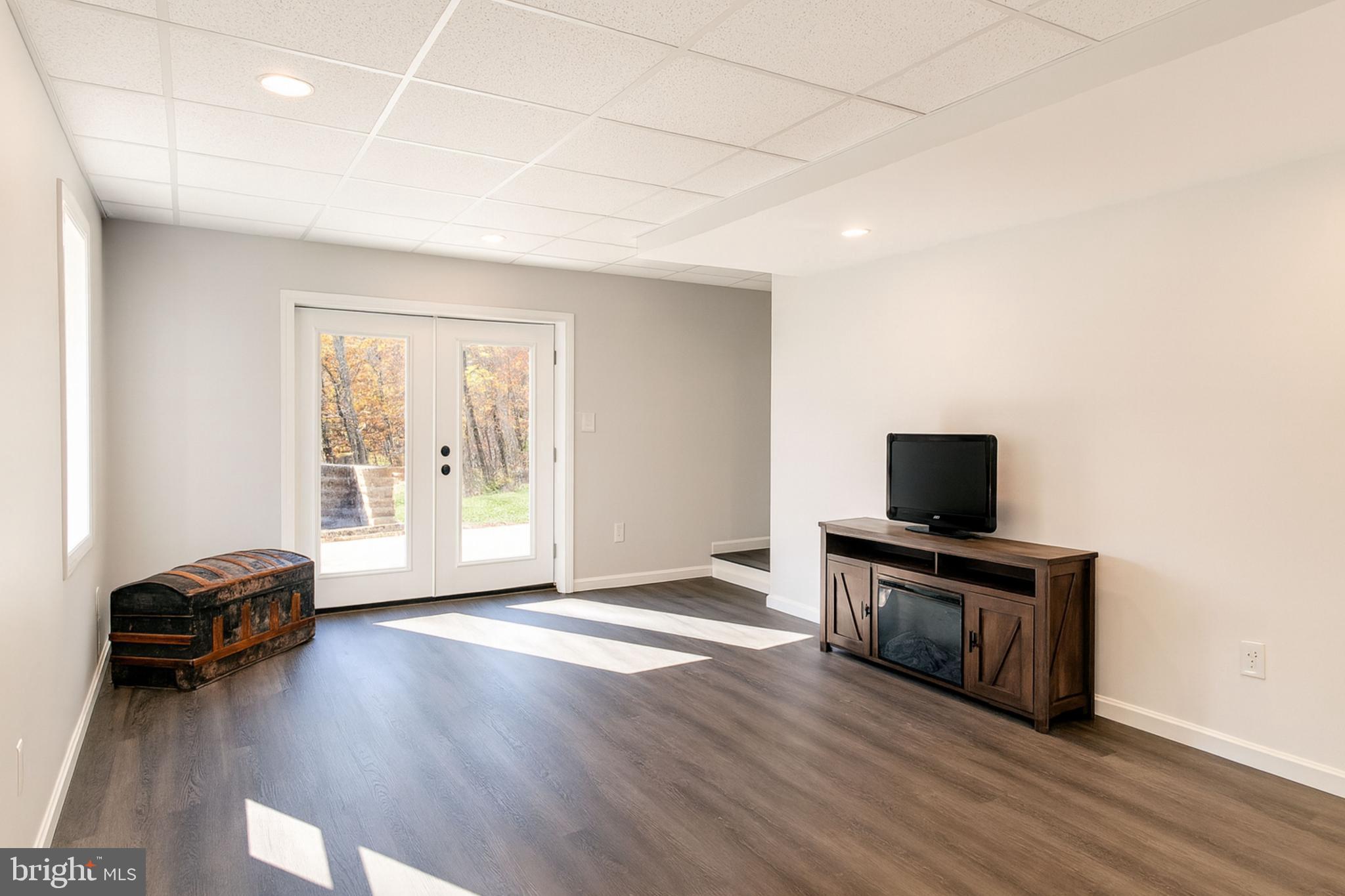 200 Mile Ridge Estates Strasburg, VA 22641 - Photo 11 of 18 a view of workspace with wooden floor and windows