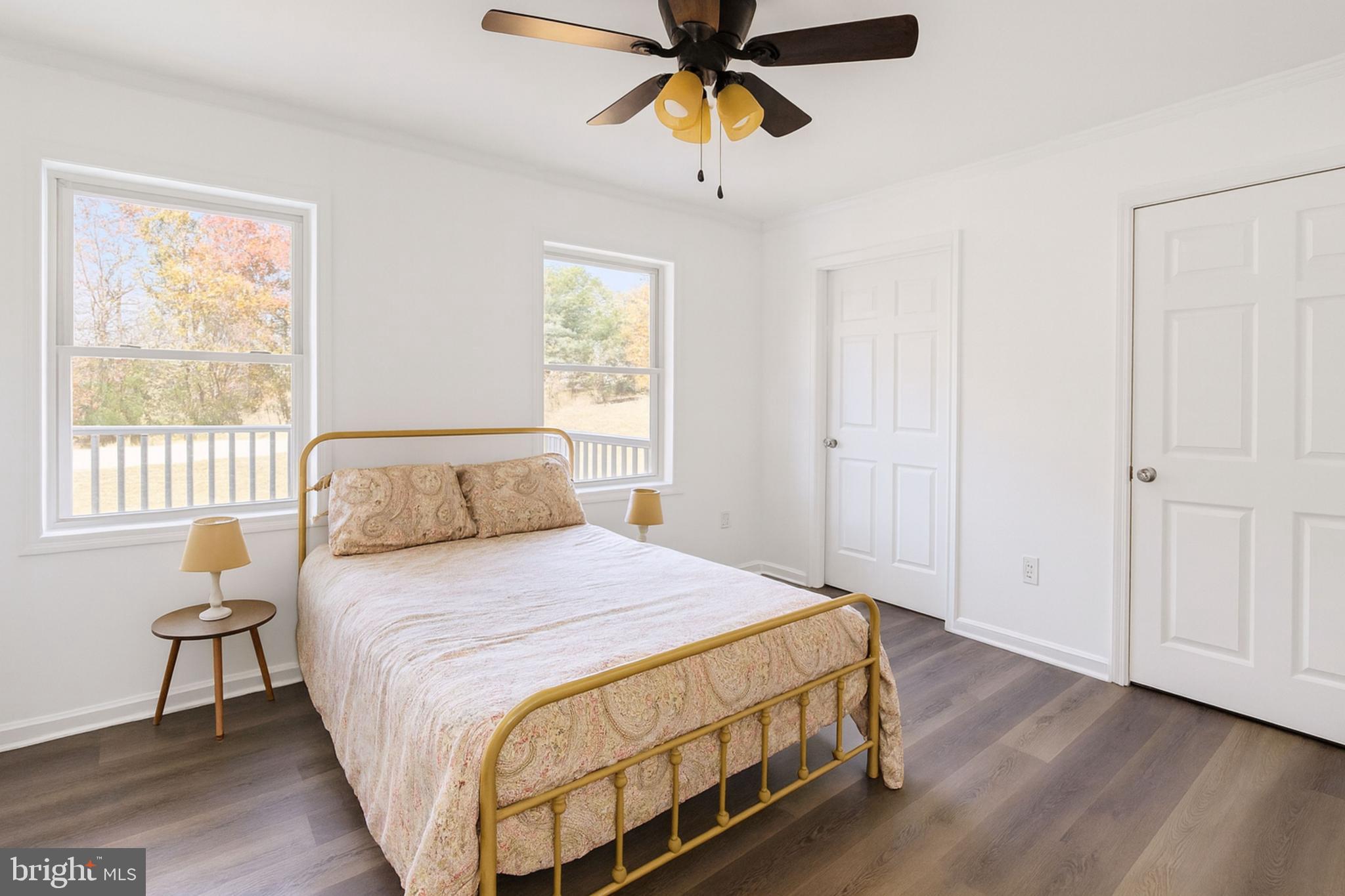 200 Mile Ridge Estates Strasburg, VA 22641 - Photo 2 of 18 a bedroom with a bed and a chandelier