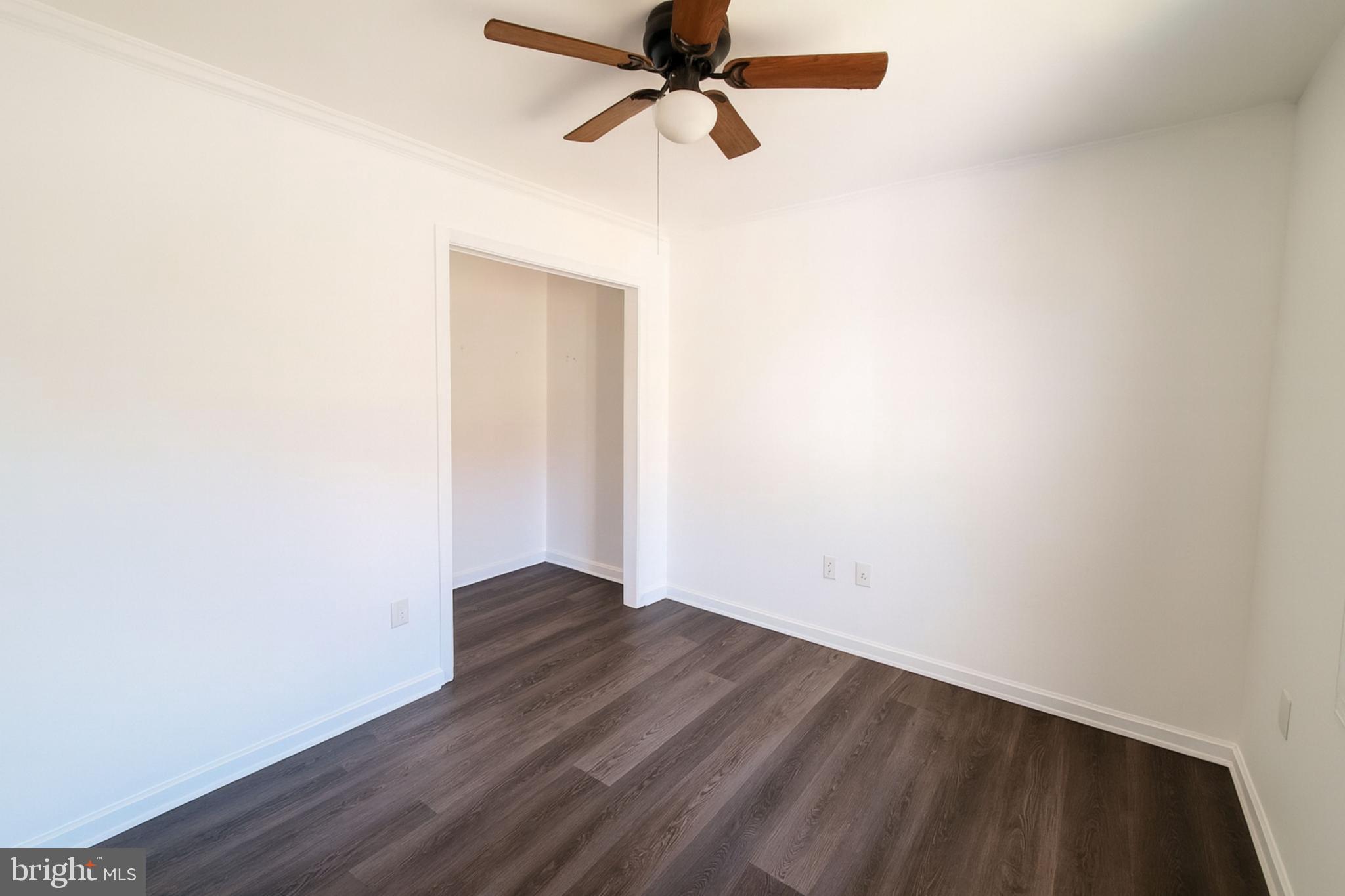 200 Mile Ridge Estates Strasburg, VA 22641 - Photo 8 of 18 a view of a big room with wooden floor and fan