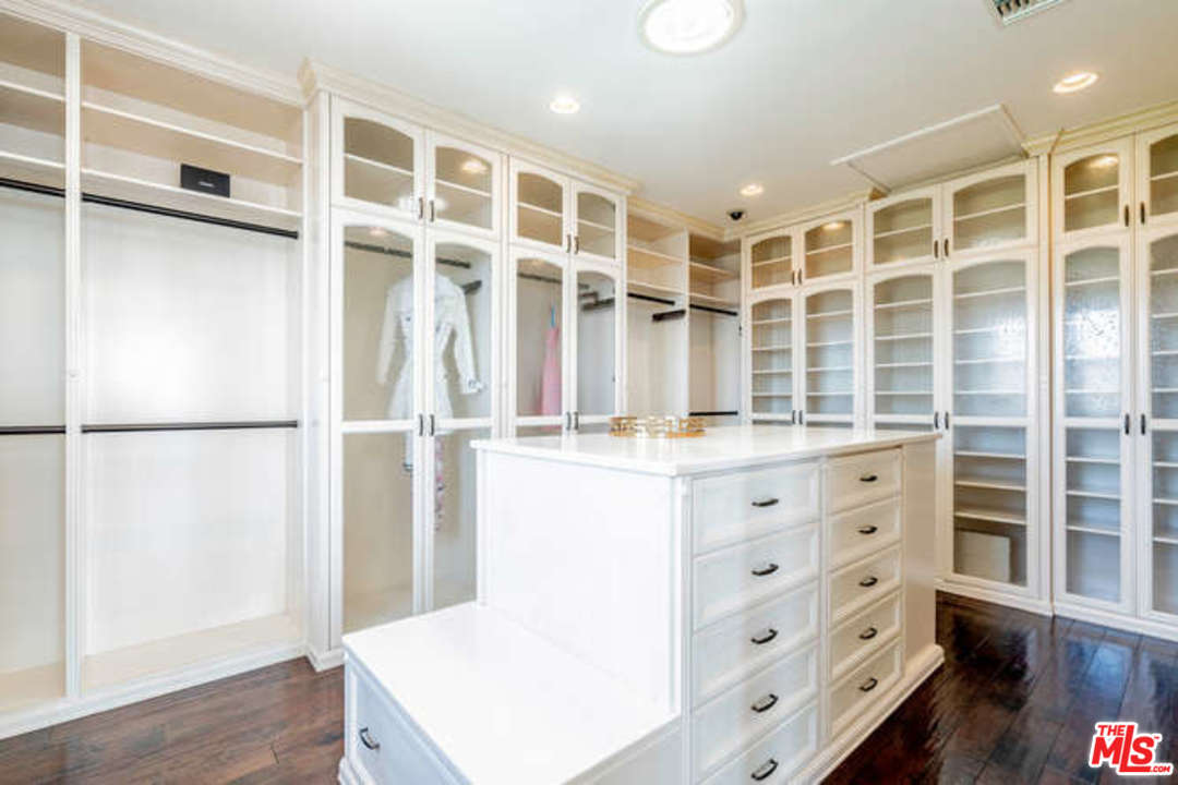 6205 Ocean Breeze Drive Malibu, CA 90265 - Photo 37 of 53 a view of kitchen with granite countertop cabinets and wooden floor