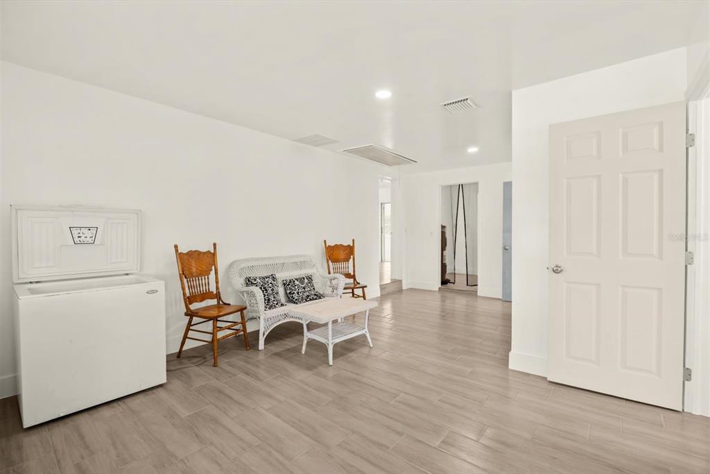 31300 Highway 441 Okeechobee, FL 34972 - Photo 14 of 33 a dining room with furniture and wooden floor