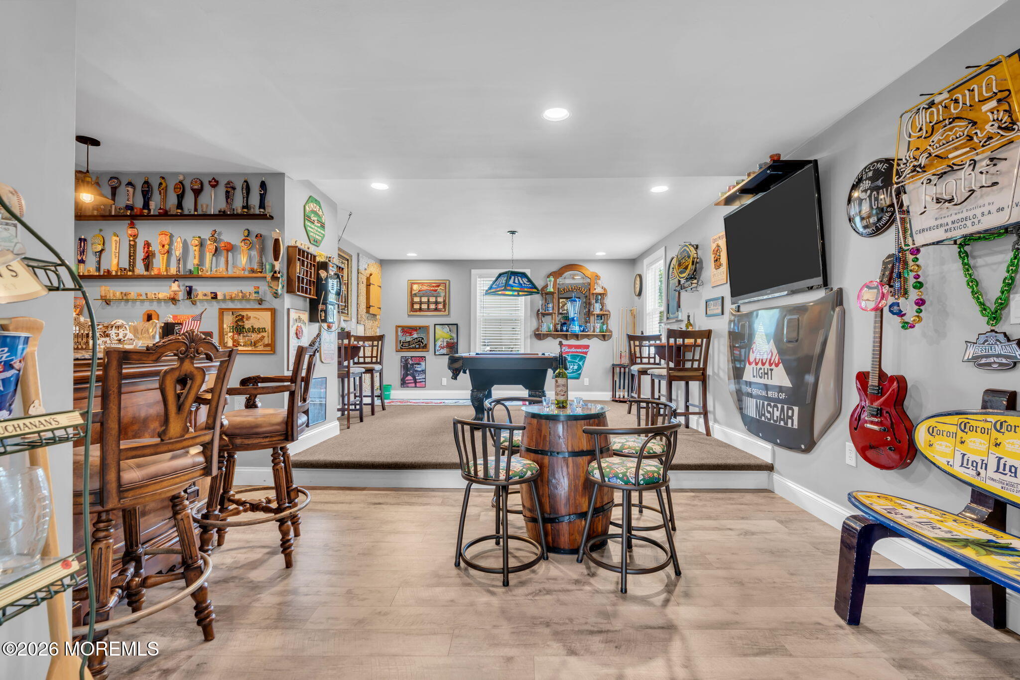 181 Locust Avenue Howell, NJ 07731 - Photo 17 of 66 a living room with lots of furniture and a flat screen tv