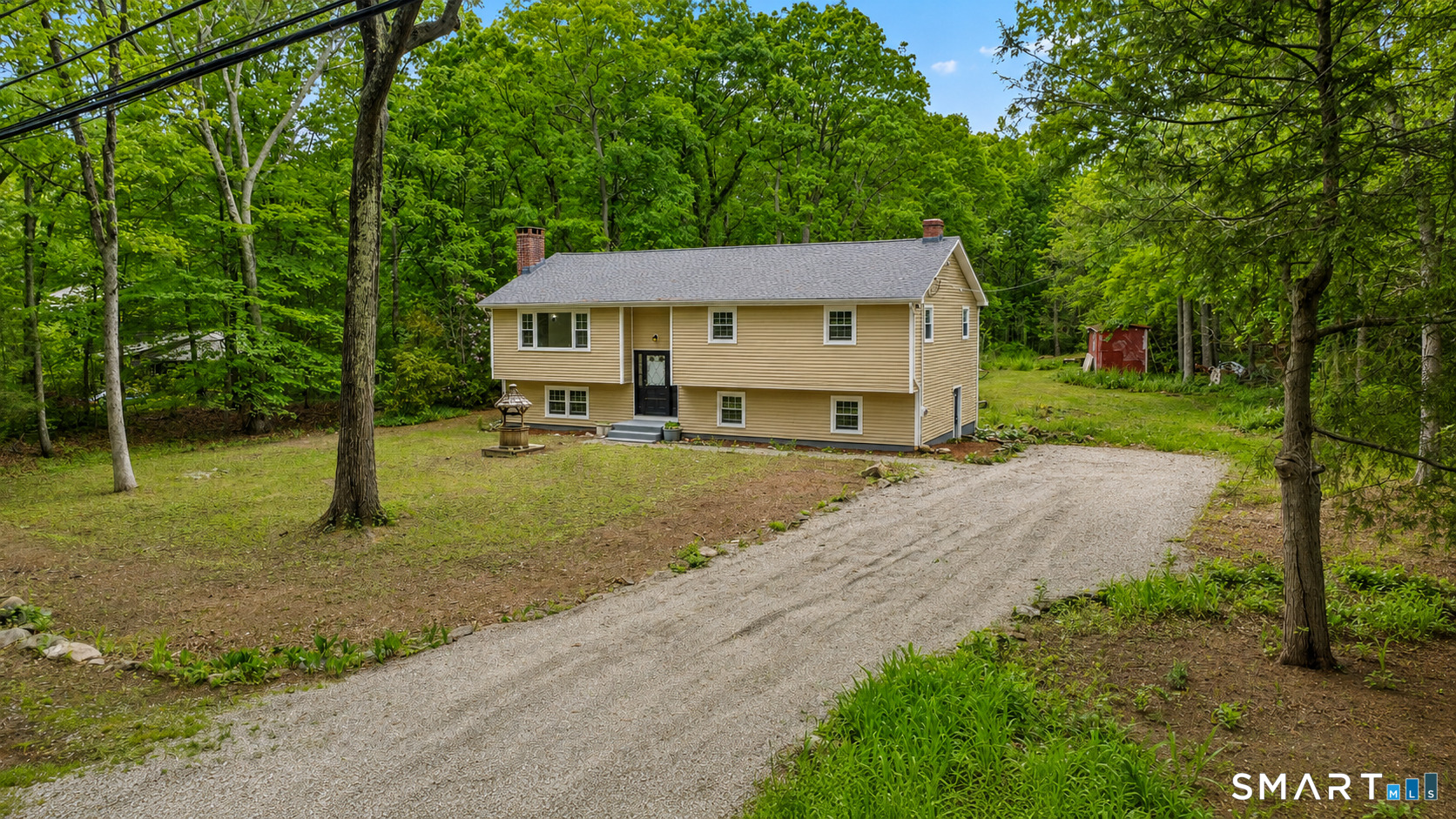 20 Quiet Woods Road East Hampton, CT 06424 - Photo 39 of 40 a house view with a garden space