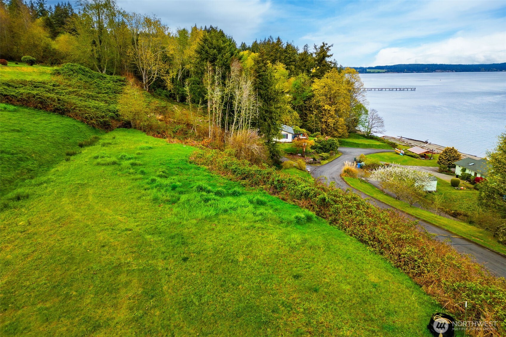 9214 163rd Avenue Southwest Longbranch, WA 98351 - Photo 11 of 33 a view of a yard with of trees