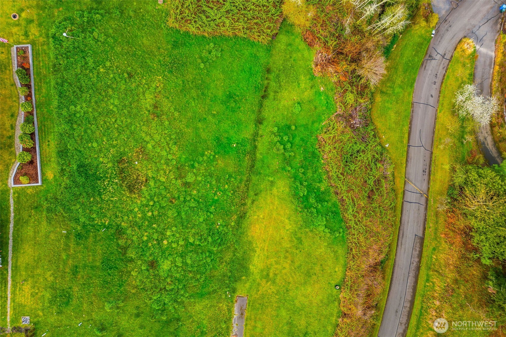 9214 163rd Avenue Southwest Longbranch, WA 98351 - Photo 23 of 33 a view of a garden