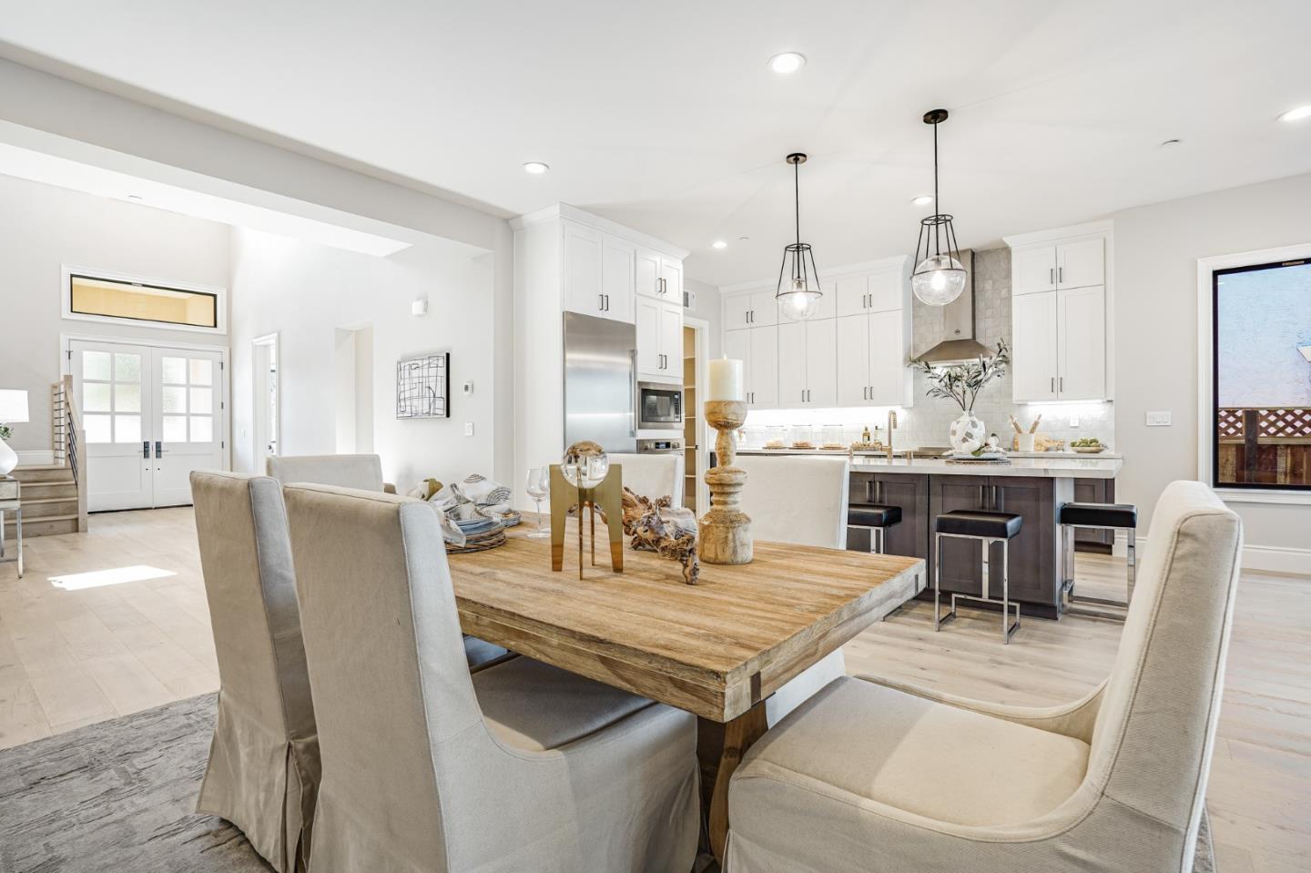 1950 Quito Road San Jose, CA 95130 - Photo 17 of 46 a dining room with furniture and wooden floor