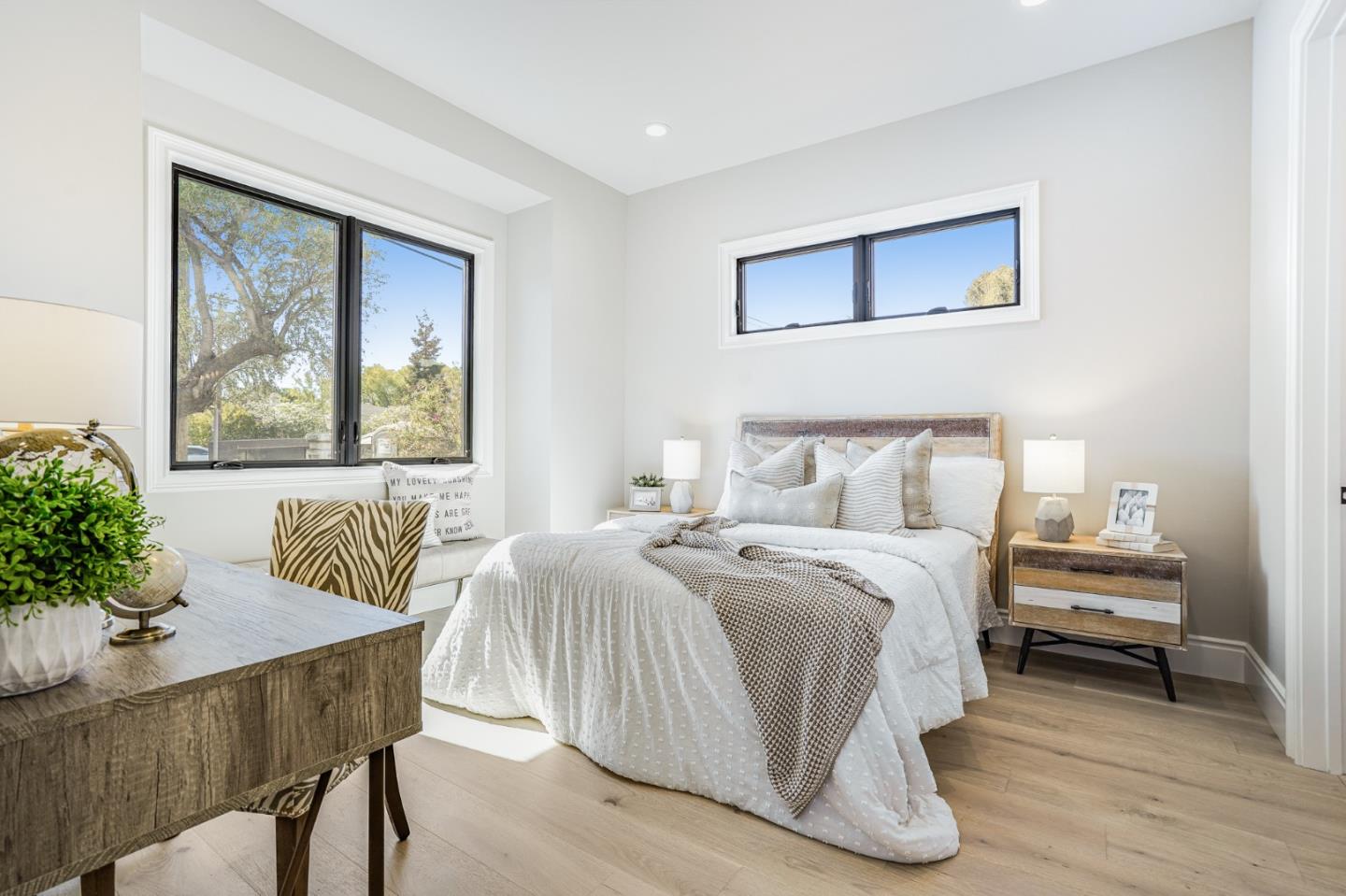 1950 Quito Road San Jose, CA 95130 - Photo 18 of 46 a bedroom with a bed and a table