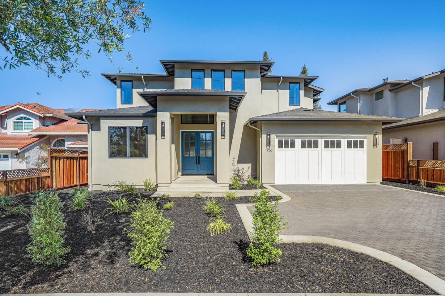 1950 Quito Road San Jose, CA 95130 - Photo 3 of 46 a front view of a house with a garden and porch