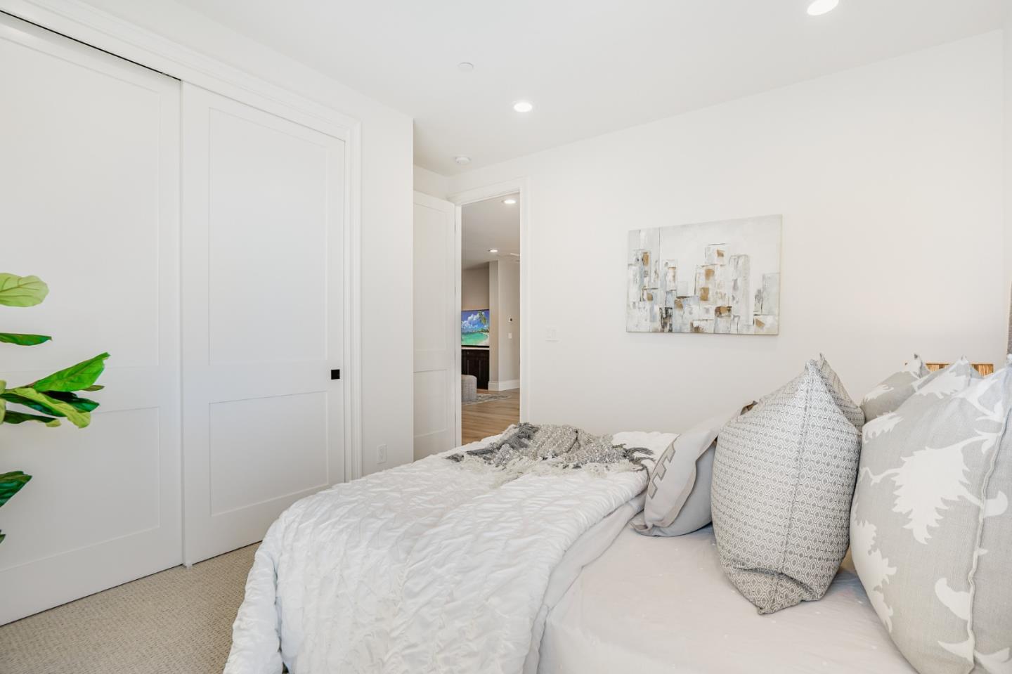 1950 Quito Road San Jose, CA 95130 - Photo 34 of 46 a bedroom with a bed and a painting on the wall