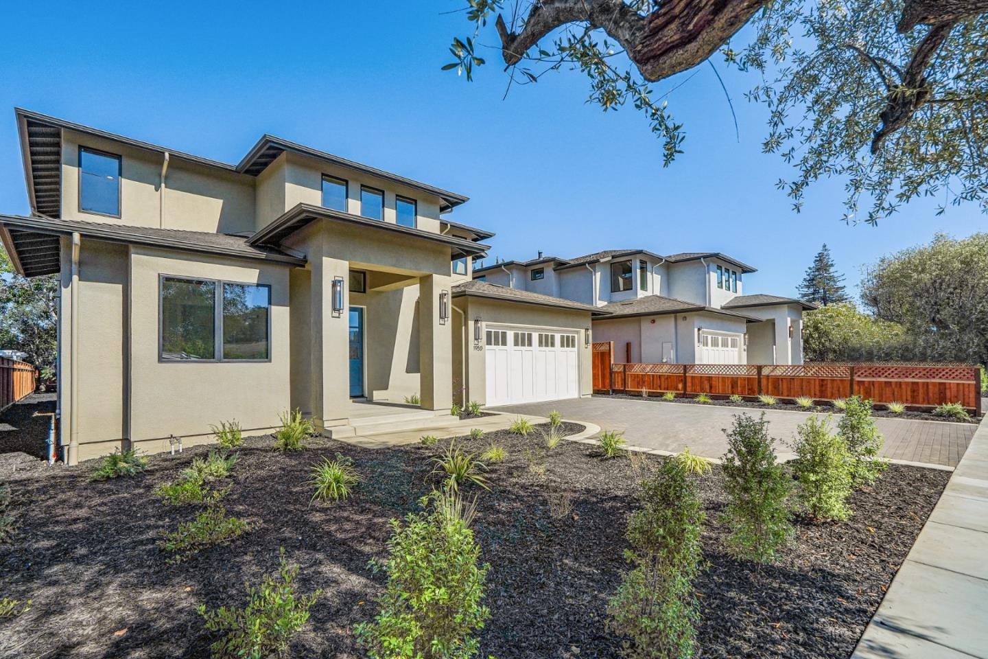 1950 Quito Road San Jose, CA 95130 - Photo 4 of 46 a front view of a house with a yard