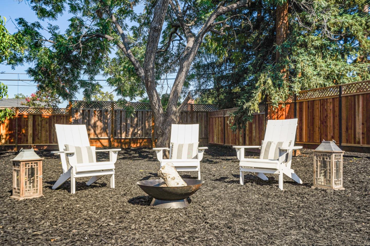 1950 Quito Road San Jose, CA 95130 - Photo 42 of 46 a white bench sitting in the middle of a park