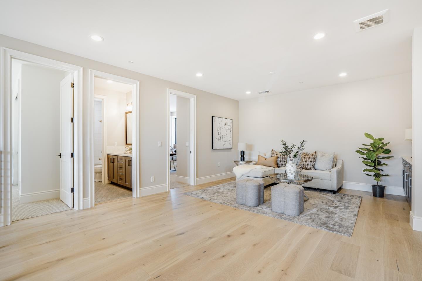 1950 Quito Road San Jose, CA 95130 - Photo 10 of 46 a living room with furniture and a potted plant