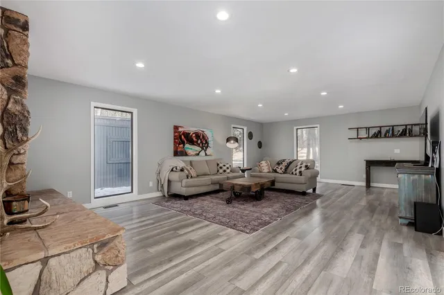 a view of a workspace with furniture