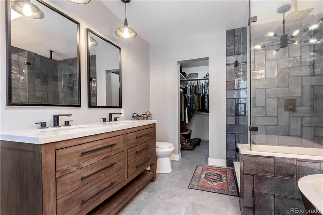 a white bath tub sitting in a bathroom