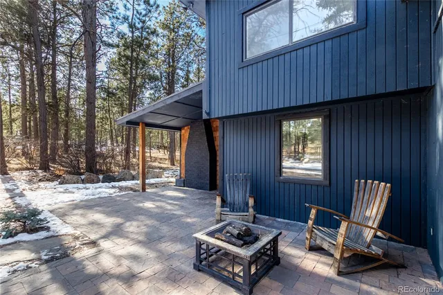 a backyard of a house with seating space