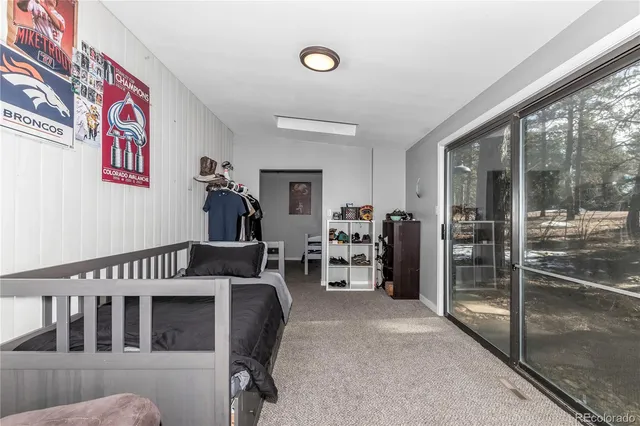 a view of a chairs and table in the patio