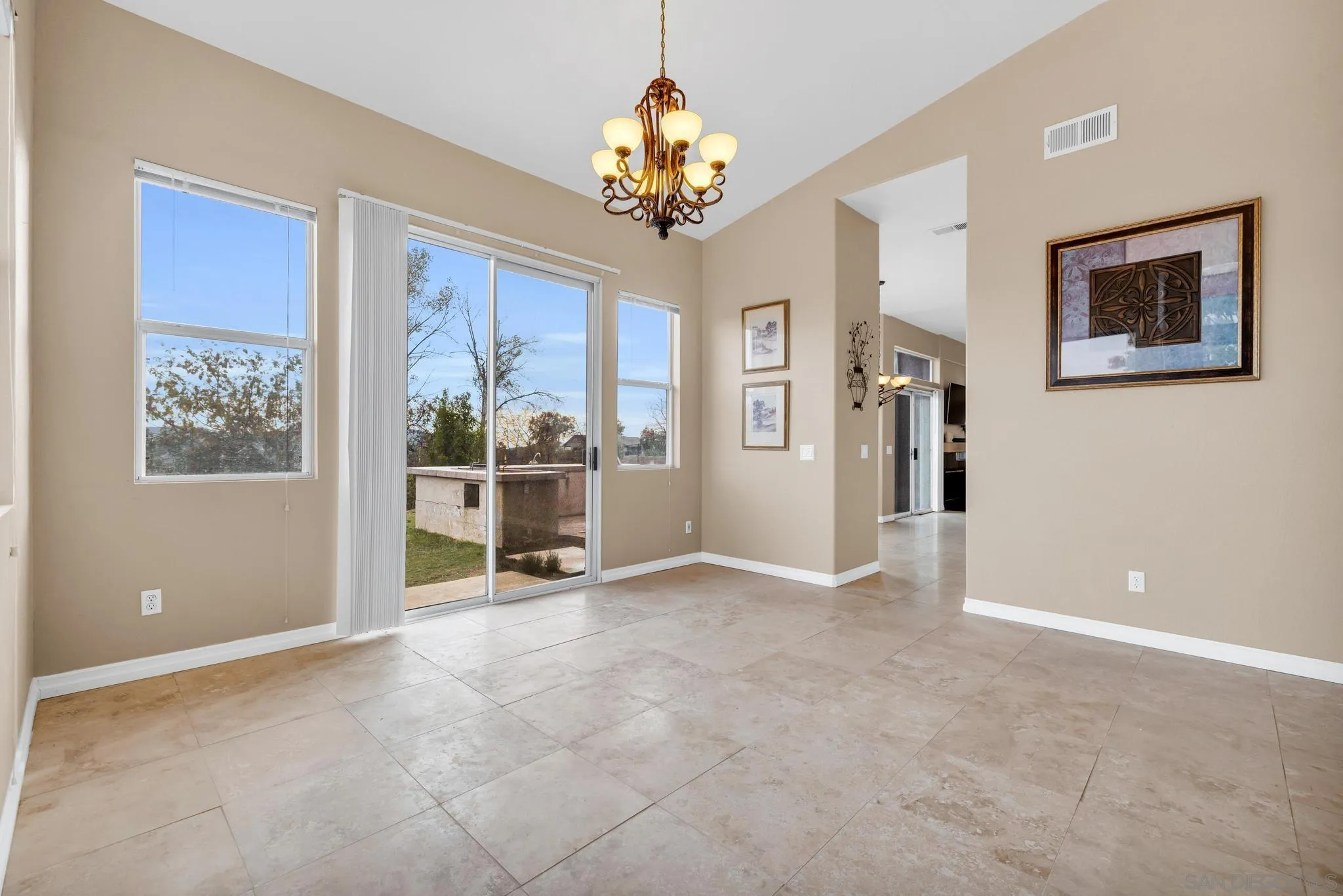 1019 Bremen Way Alpine, CA 91901 - Photo 14 of 68 a view of a livingroom with a chandelier furniture and windows