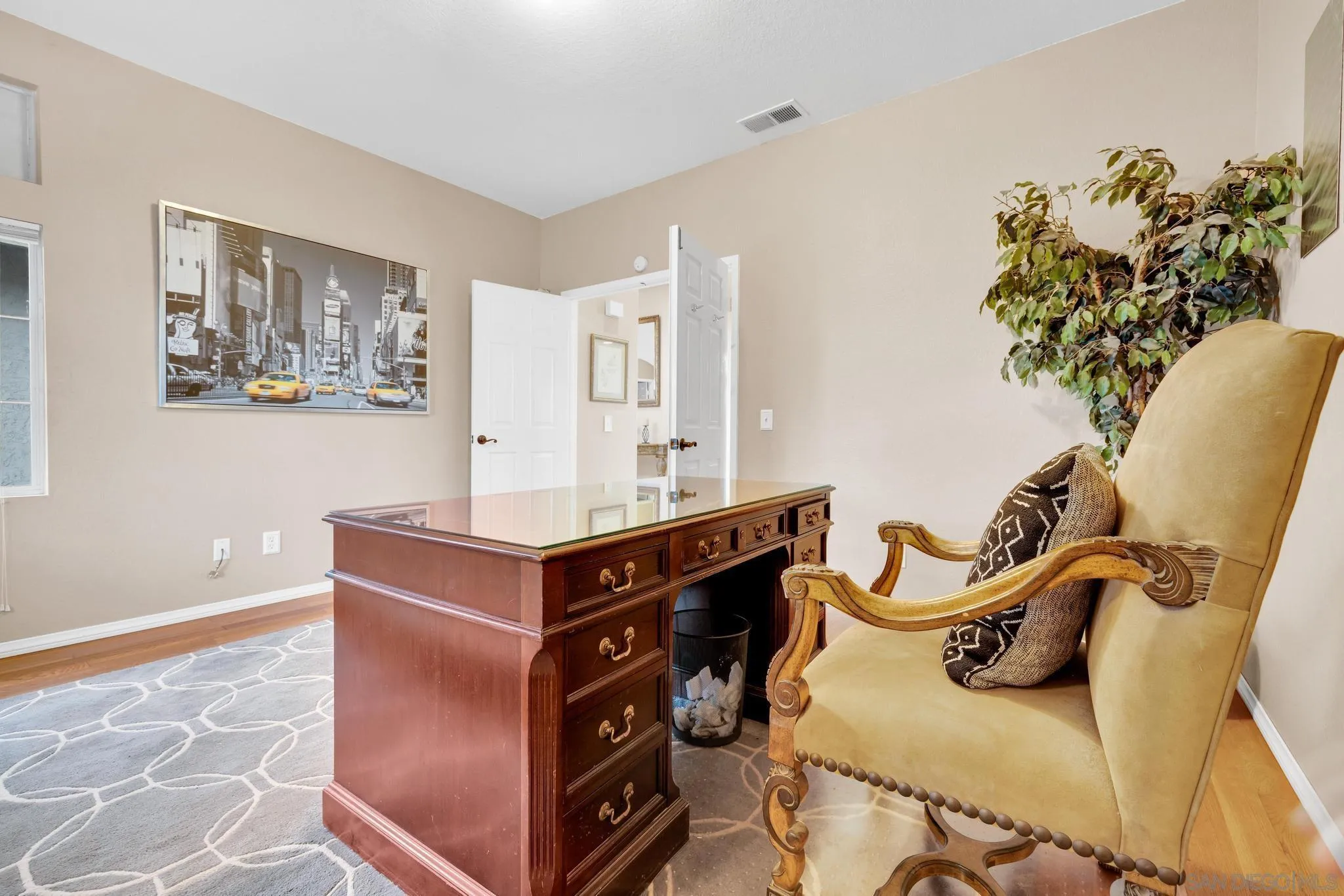 1019 Bremen Way Alpine, CA 91901 - Photo 22 of 68 a room with furniture and potted plant