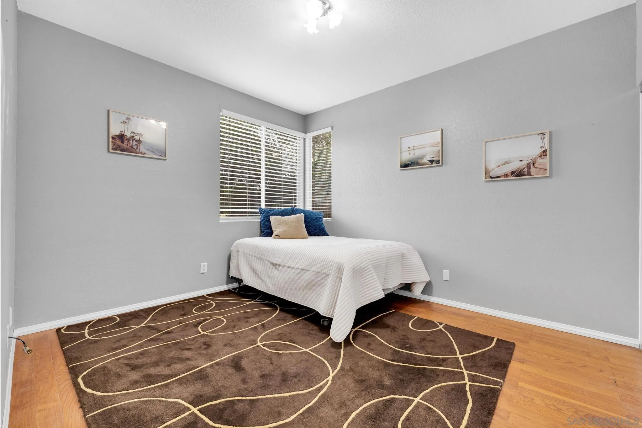 1019 Bremen Way Alpine, CA 91901 - Photo 25 of 68 a bedroom with a bed and a window