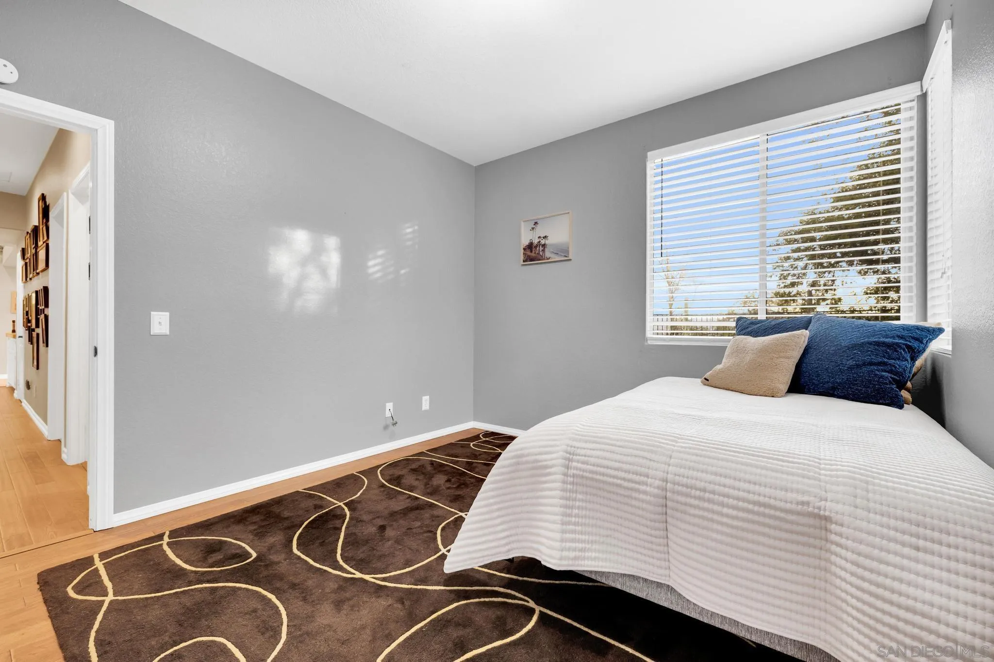 1019 Bremen Way Alpine, CA 91901 - Photo 26 of 68 a bedroom with a bed and window