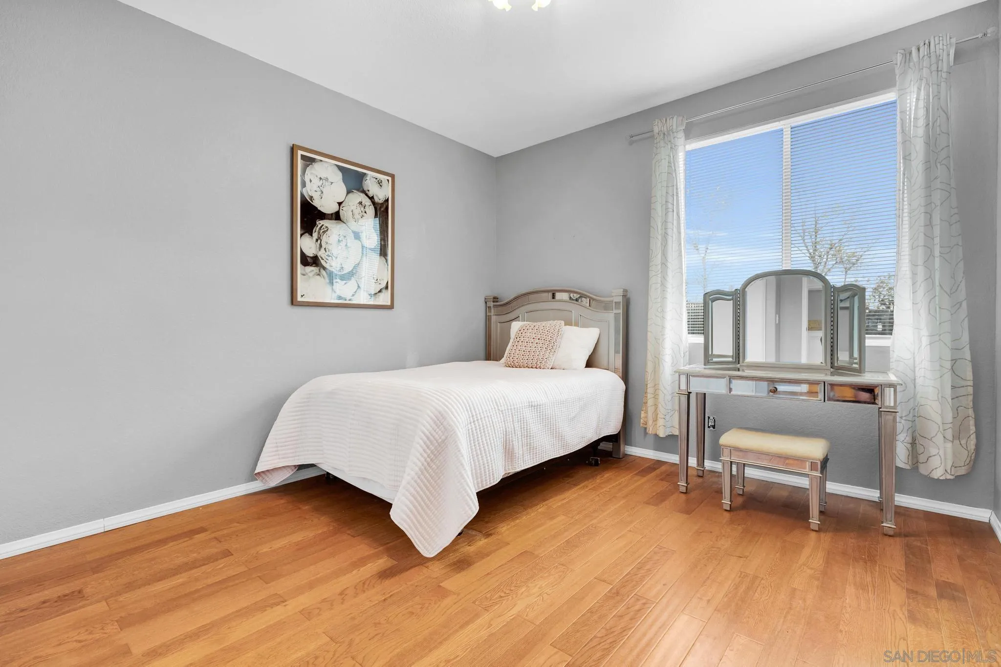 1019 Bremen Way Alpine, CA 91901 - Photo 28 of 68 a bedroom with a bed and a desk