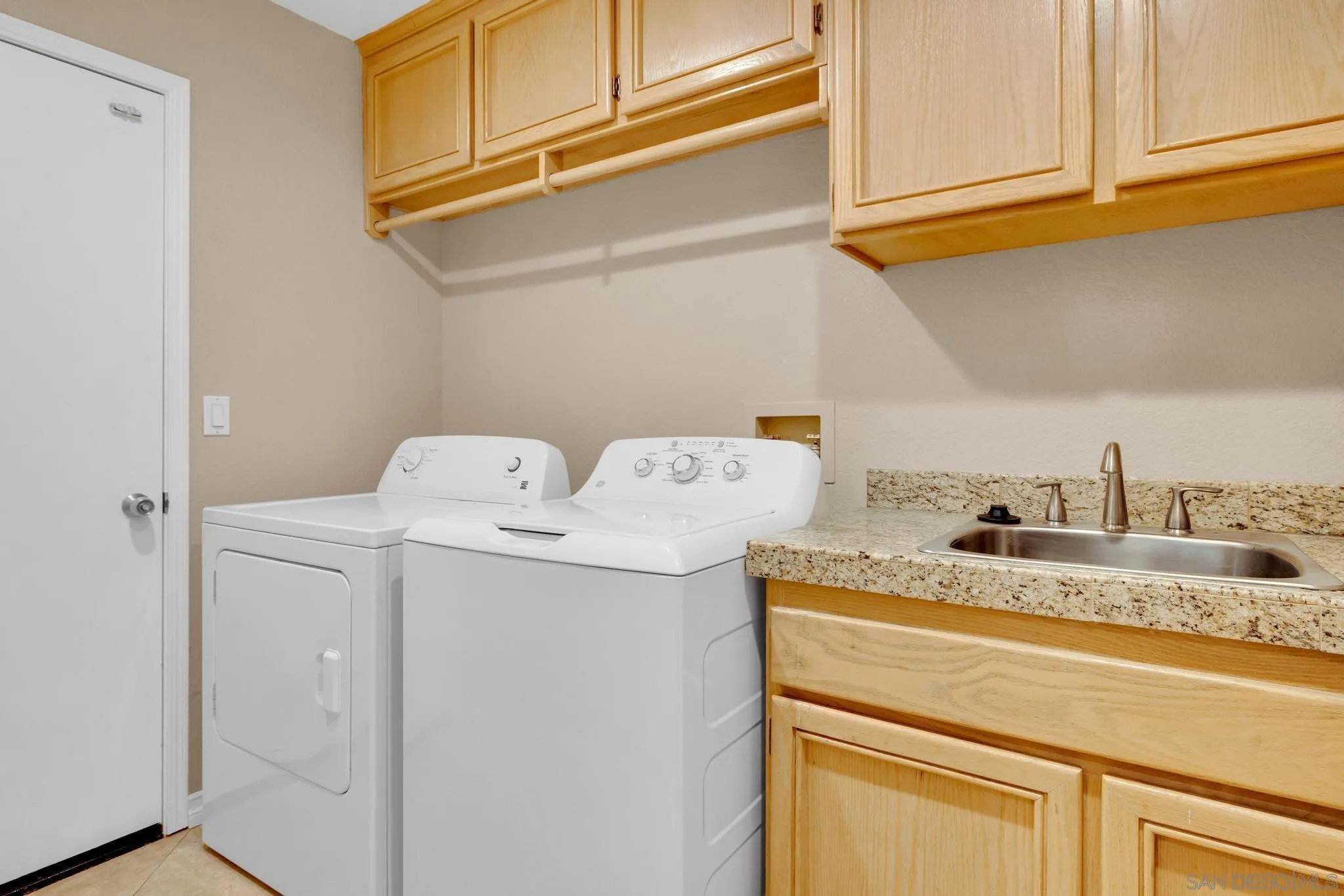 1019 Bremen Way Alpine, CA 91901 - Photo 31 of 68 a utility room with dryer and washer