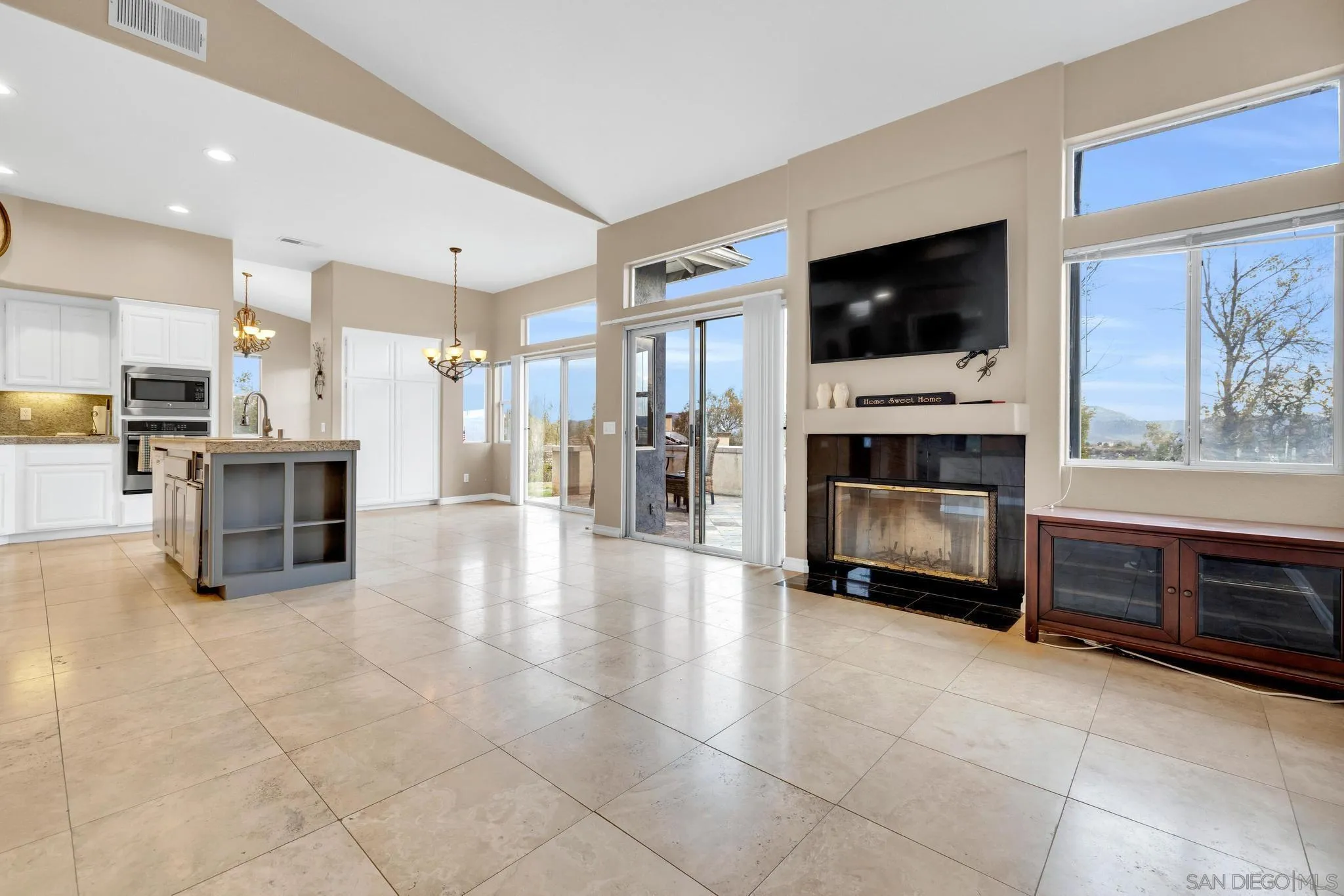 1019 Bremen Way Alpine, CA 91901 - Photo 33 of 68 a view of a livingroom with furniture kitchen and a fireplace