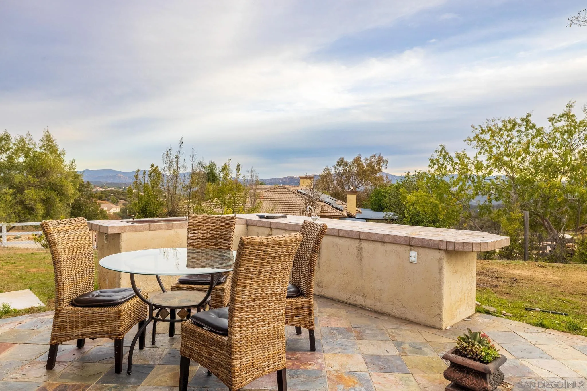 1019 Bremen Way Alpine, CA 91901 - Photo 36 of 68 a view of a chairs and table on the terrace