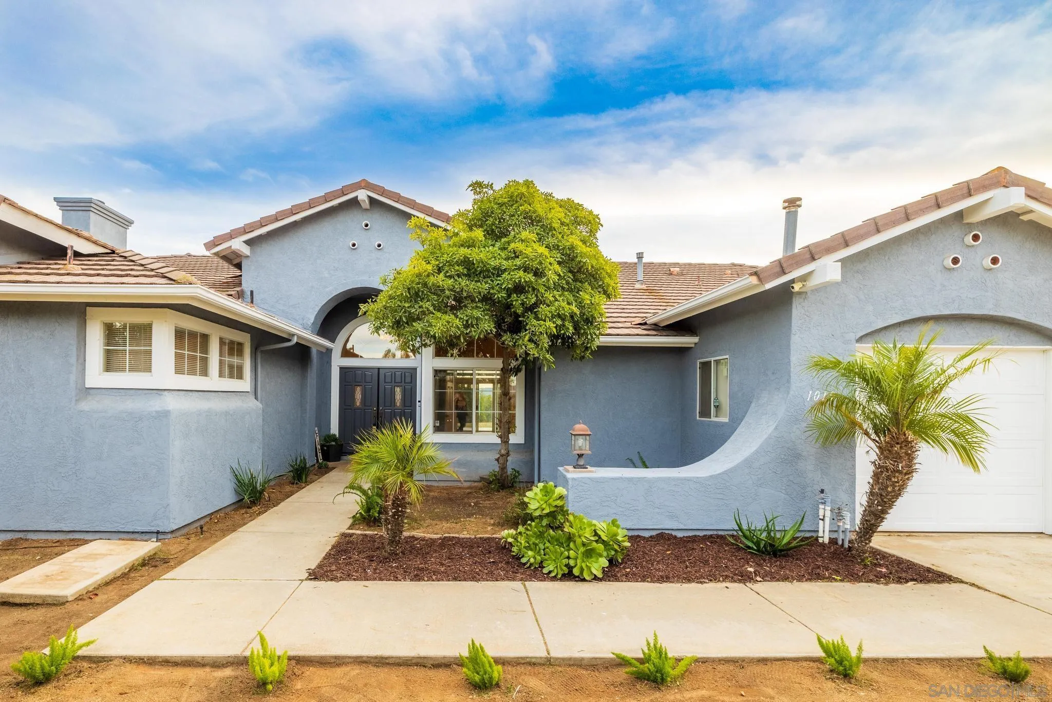 1019 Bremen Way Alpine, CA 91901 - Photo 4 of 68 a front view of a house with garden