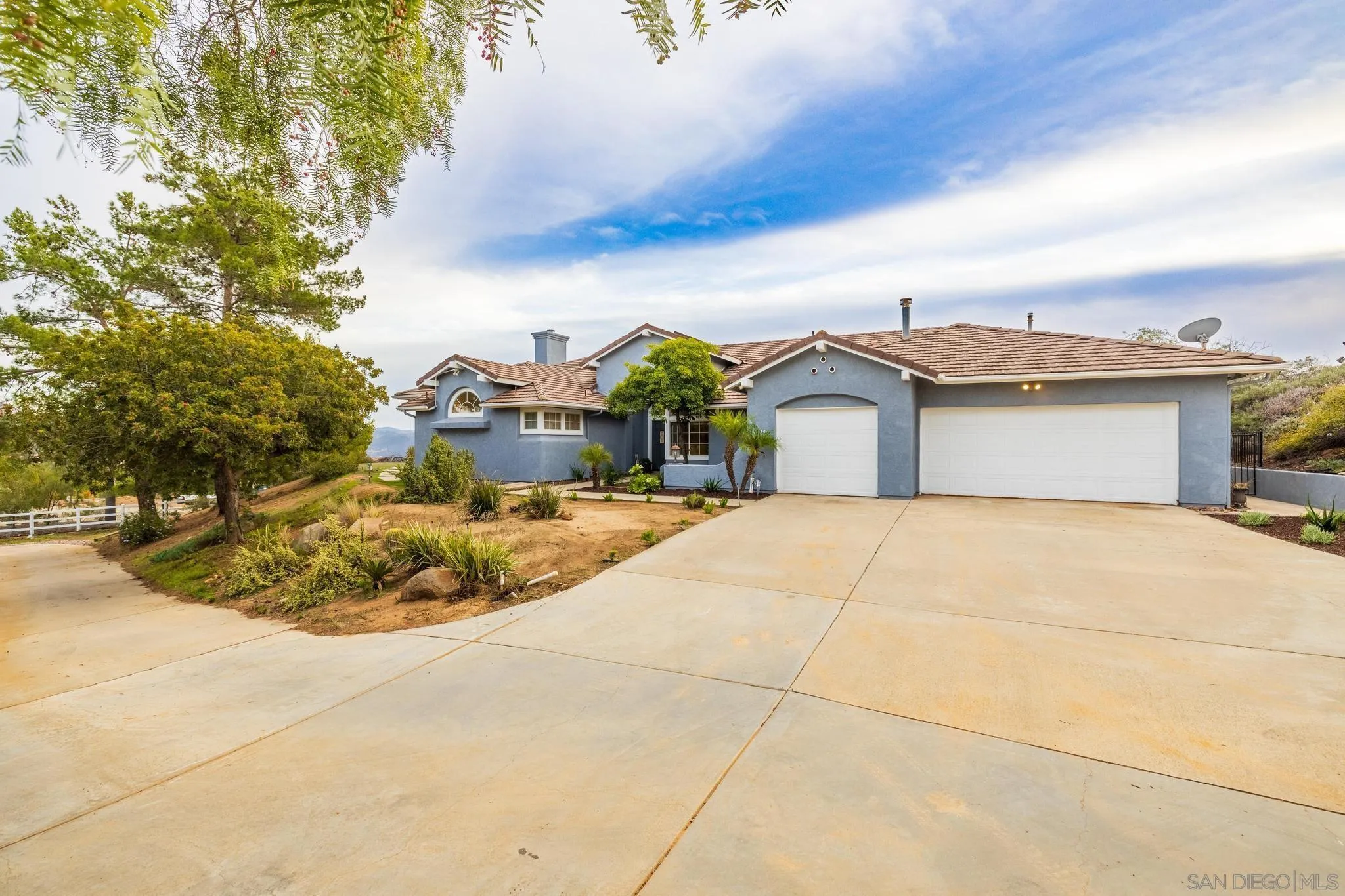 1019 Bremen Way Alpine, CA 91901 - Photo 41 of 68 a front view of a house with a yard