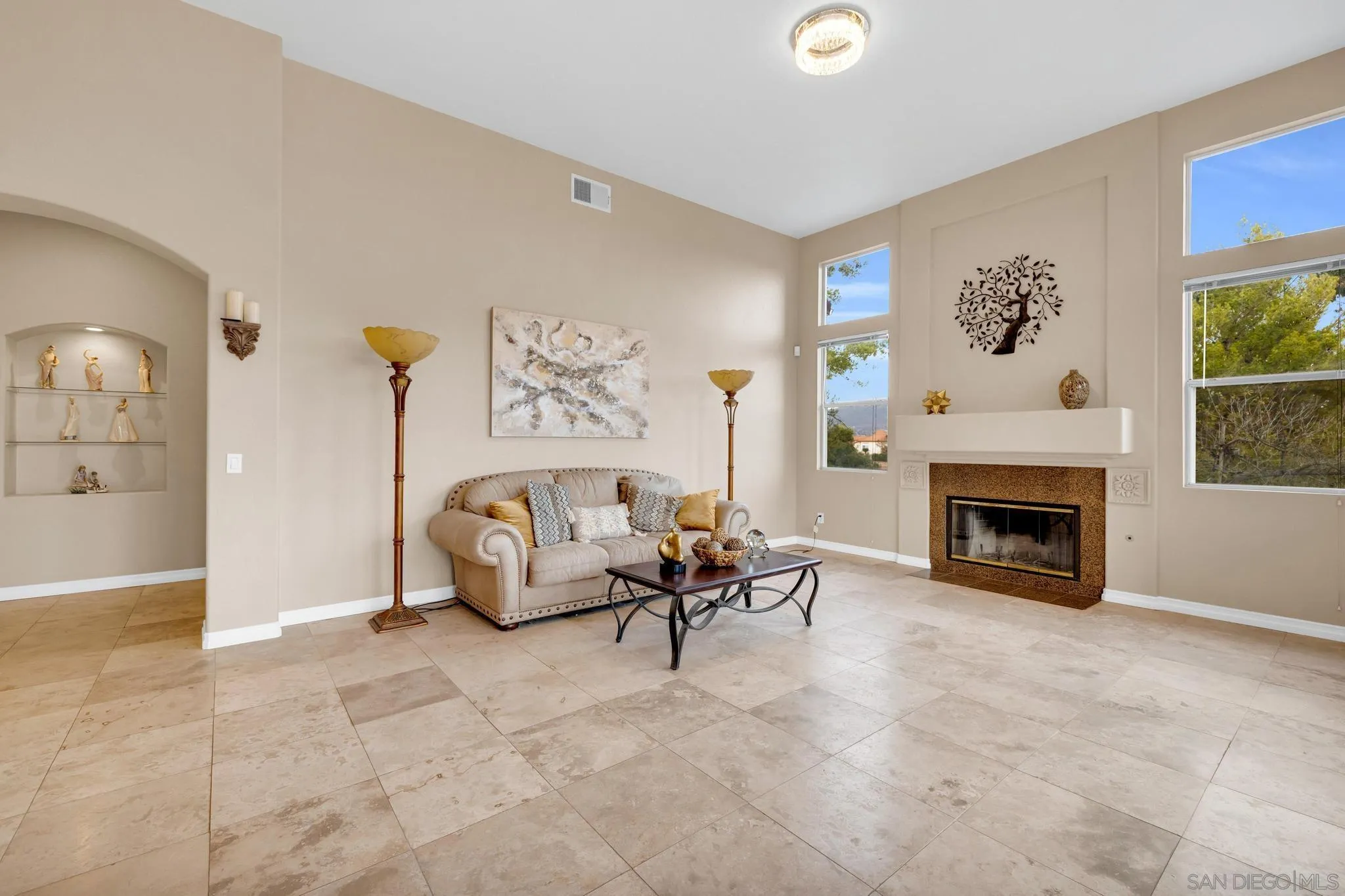 1019 Bremen Way Alpine, CA 91901 - Photo 6 of 68 a living room with furniture and a fireplace