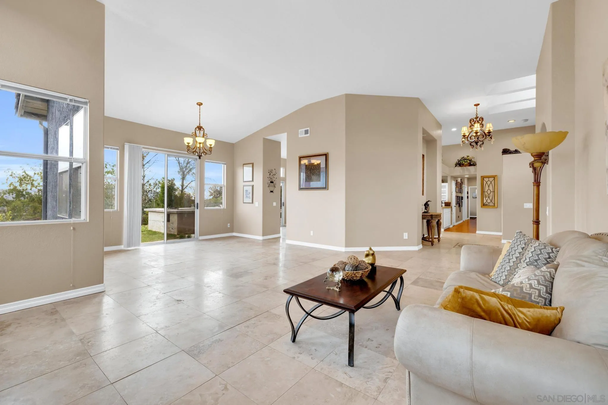 1019 Bremen Way Alpine, CA 91901 - Photo 8 of 68 a living room with furniture and a chandelier