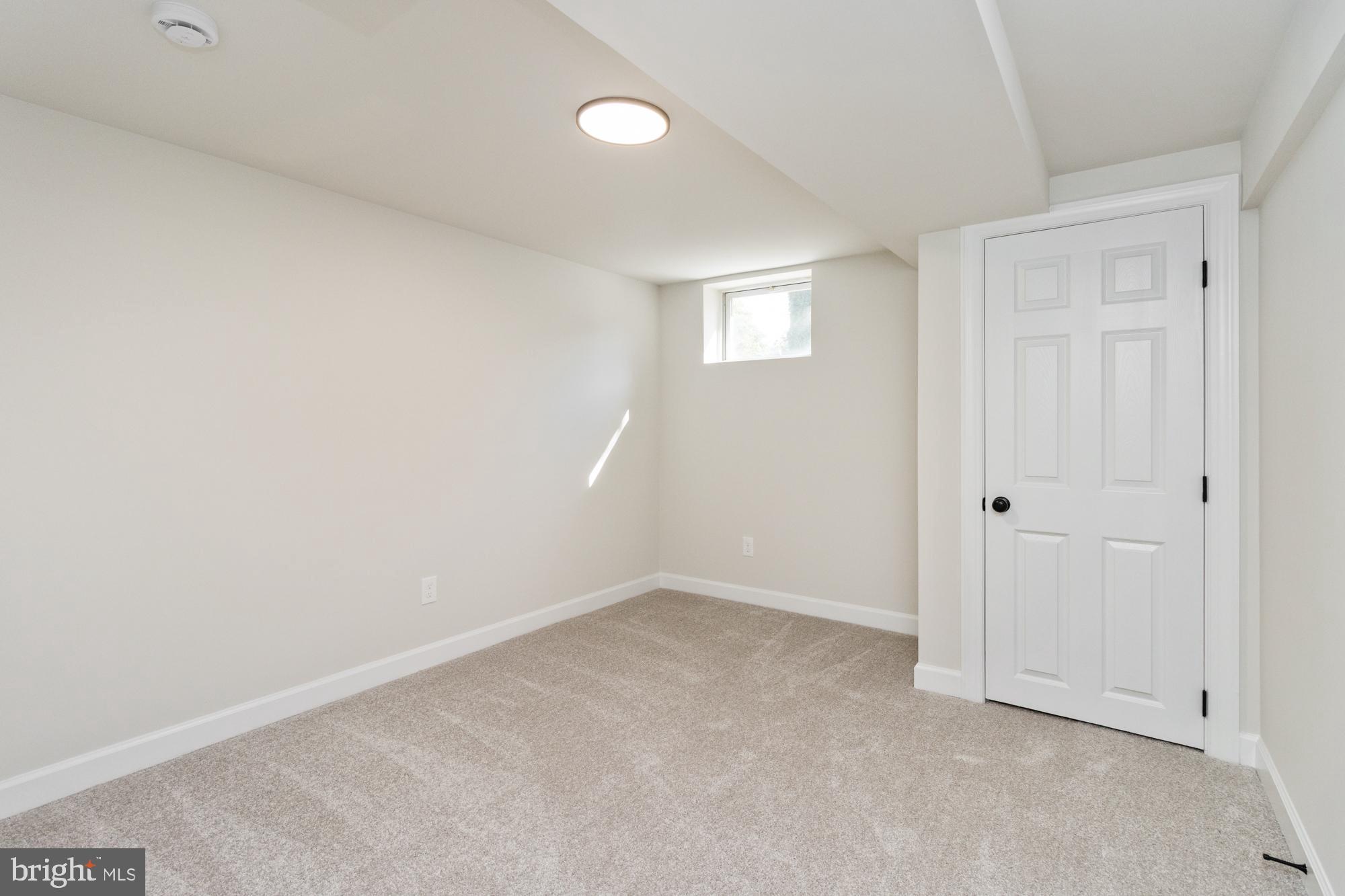 8016 Harris Avenue Parkville, MD 21234 - Photo 26 of 34 a view of an empty room with closet area