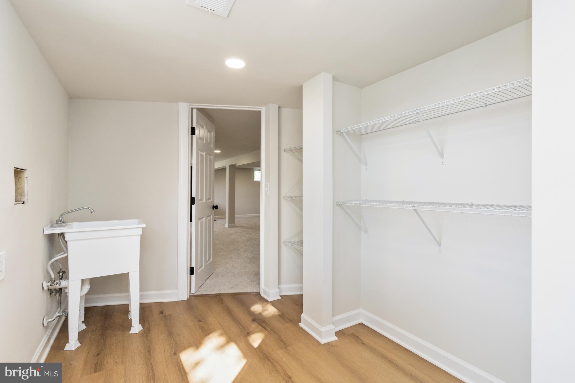 8016 Harris Avenue Parkville, MD 21234 - Photo 29 of 34 a view of livingroom with furniture and wooden floor
