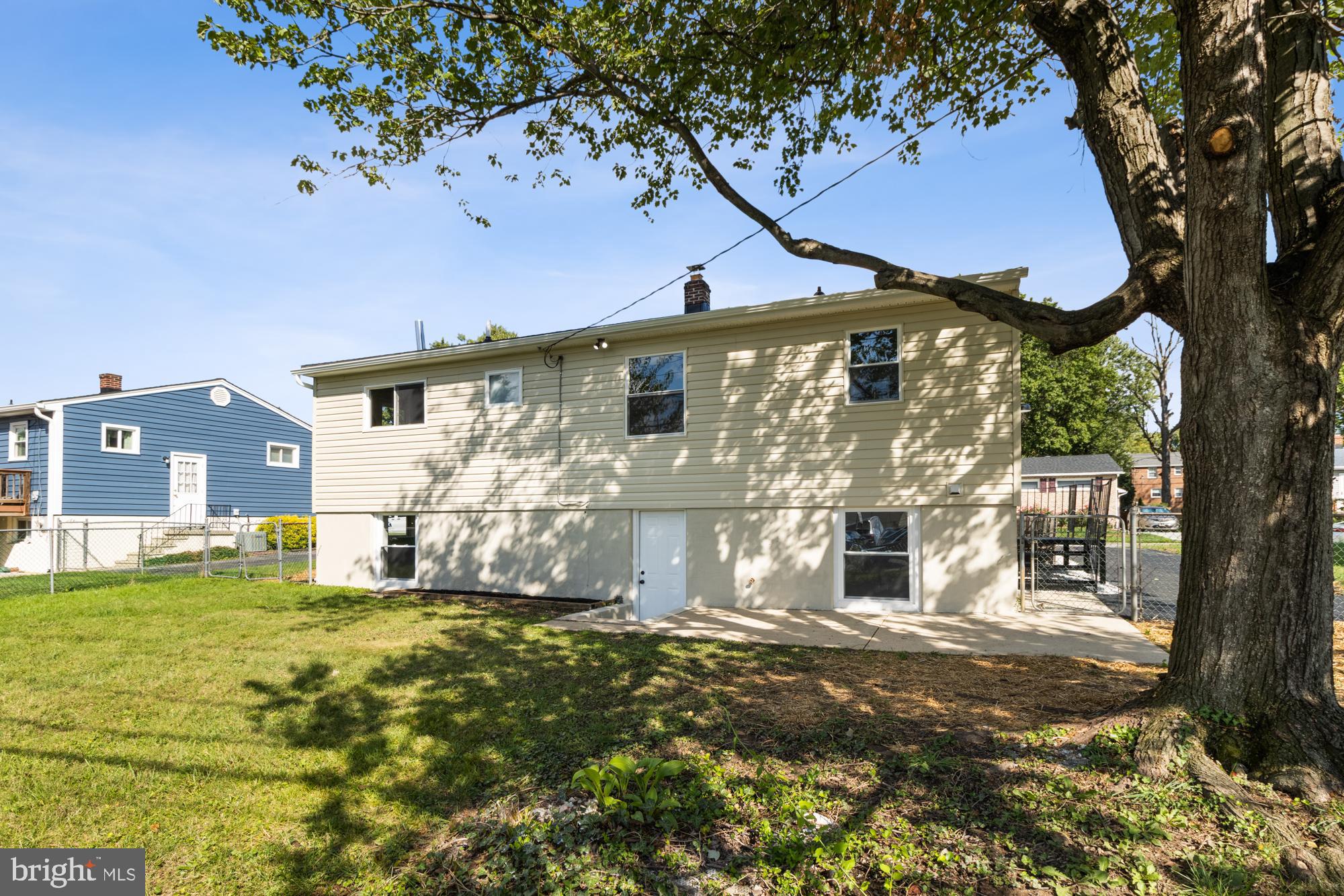 8016 Harris Avenue Parkville, MD 21234 - Photo 32 of 34 a front view of a house with a yard