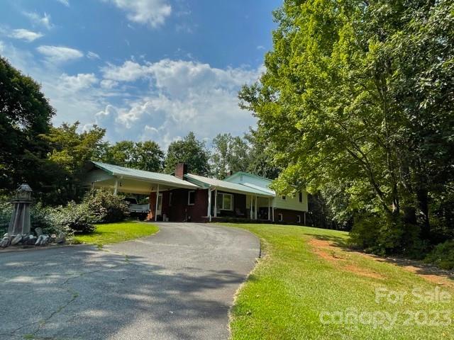 709 Green Road Rutherfordton, NC 28139 - Photo 1 of 46 a view of a house with a yard