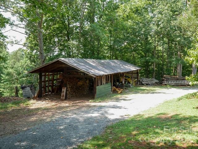 709 Green Road Rutherfordton, NC 28139 - Photo 11 of 46 a backyard of a house with barbeque oven