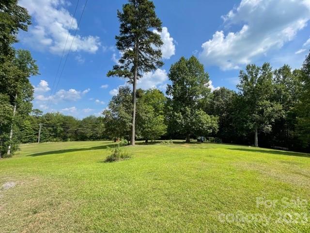 709 Green Road Rutherfordton, NC 28139 - Photo 13 of 46 a view of outdoor space with a garden and trees