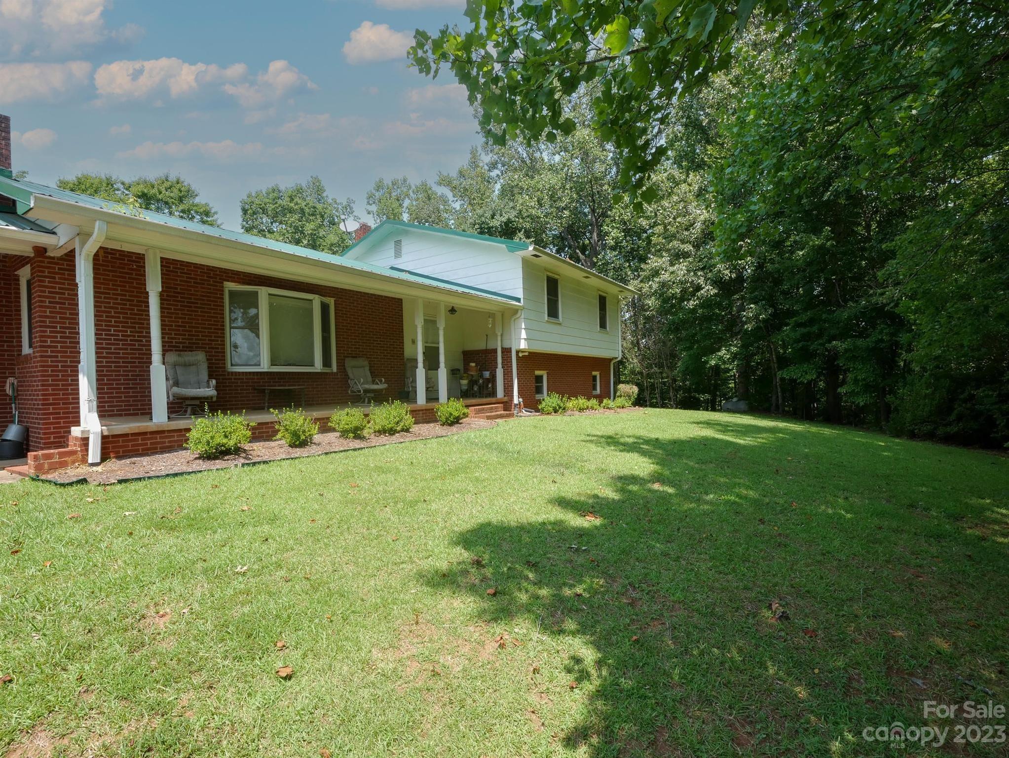 709 Green Road Rutherfordton, NC 28139 - Photo 19 of 46 a front view of house with yard and green space