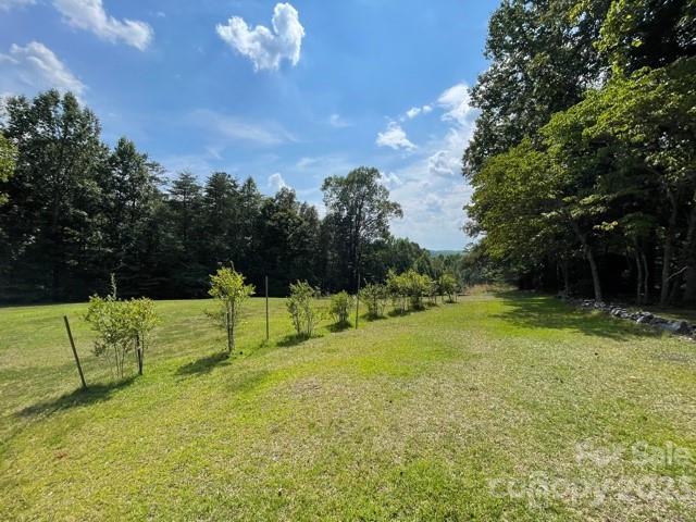 709 Green Road Rutherfordton, NC 28139 - Photo 20 of 46 a view of a golf course with a bench
