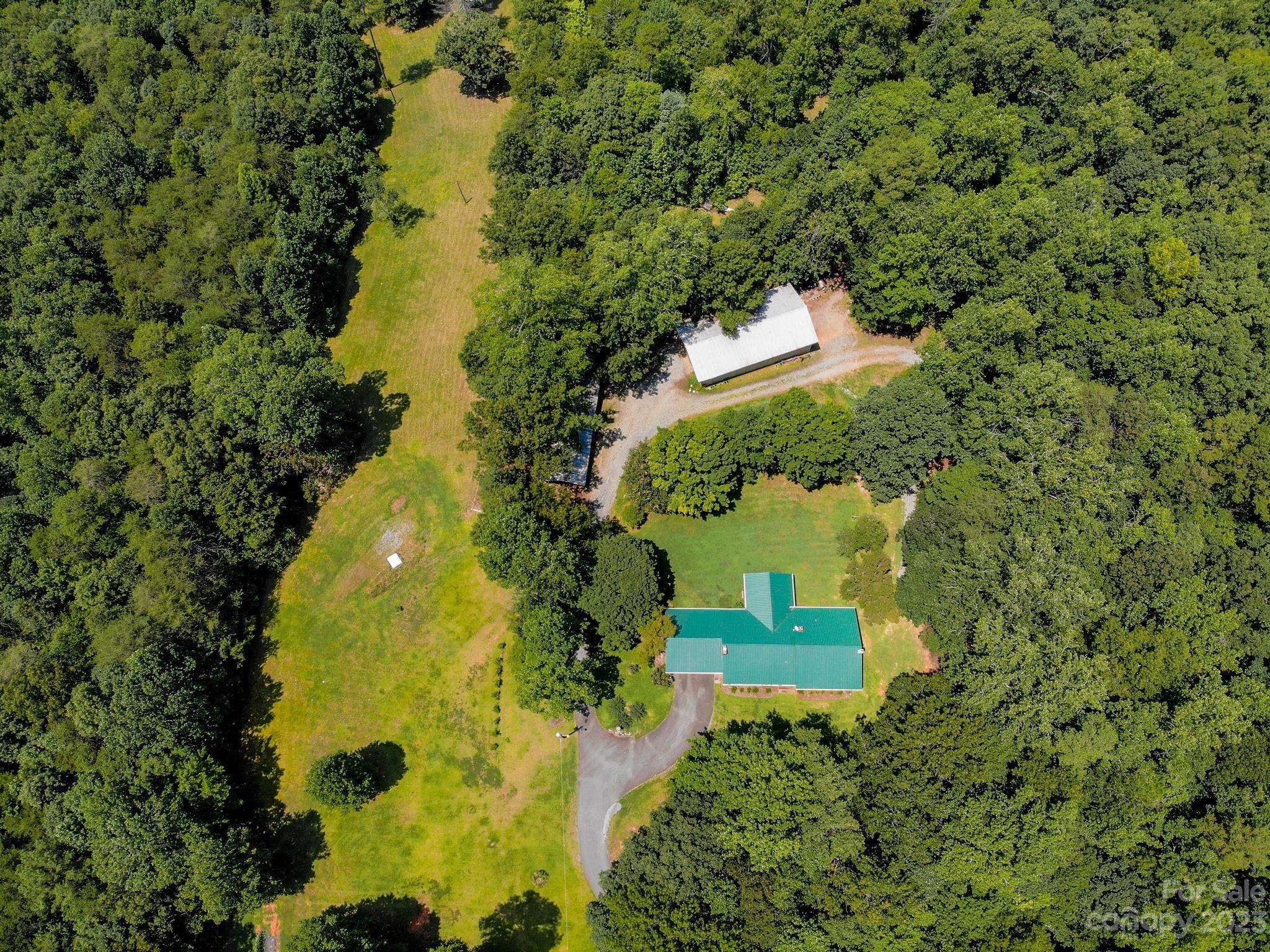 709 Green Road Rutherfordton, NC 28139 - Photo 3 of 46 an aerial view of a residential houses with yard