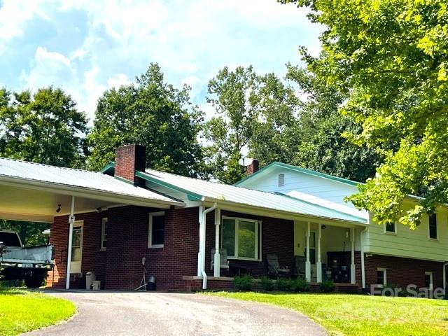 709 Green Road Rutherfordton, NC 28139 - Photo 40 of 46 a front view of a house with a yard