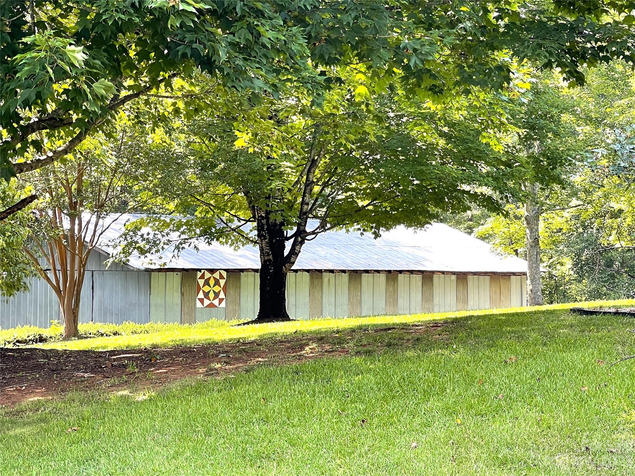 709 Green Road Rutherfordton, NC 28139 - Photo 5 of 46 a view of swimming pool with tree in front of it