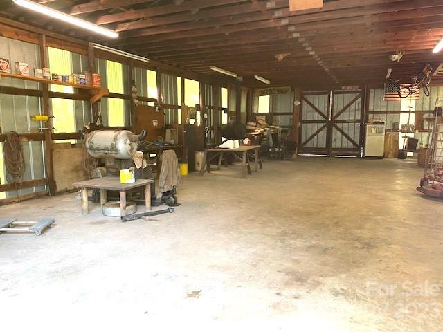 709 Green Road Rutherfordton, NC 28139 - Photo 7 of 46 a room with lots of chairs and mirrors