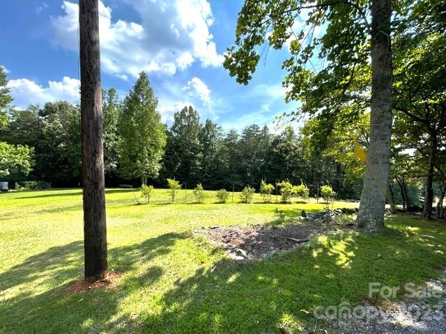 709 Green Road Rutherfordton, NC 28139 - Photo 10 of 46 a view of a swimming pool and trees in the background